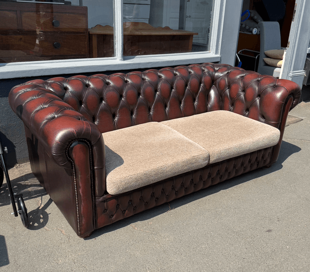 A Pair Of Oxblood Leather Chesterfields (£285 each)