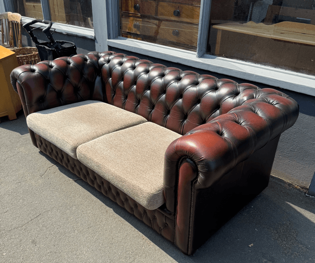 A Pair Of Oxblood Leather Chesterfields (£285 each)