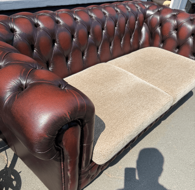 A Pair Of Oxblood Leather Chesterfields (£285 each)