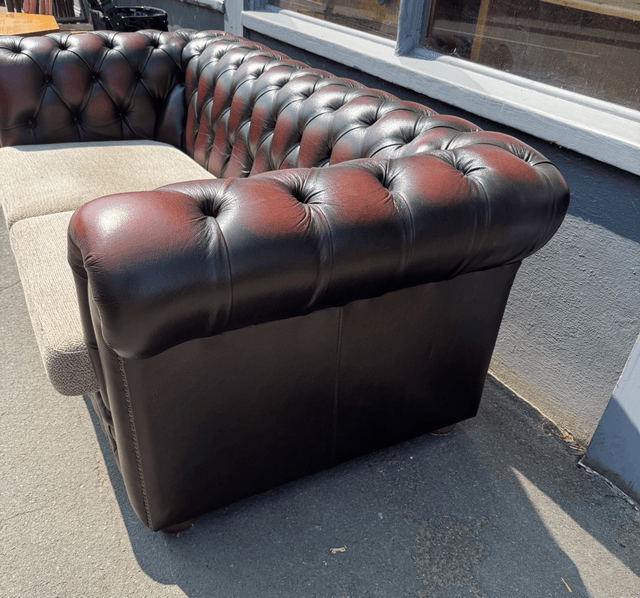 A Pair Of Oxblood Leather Chesterfields (£285 each)
