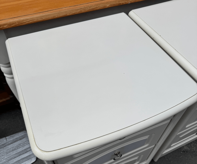 A Pair Of Solid White Bedsides